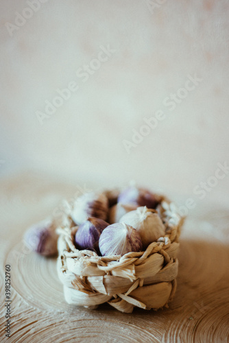 Garlic in a light wicker basket.
