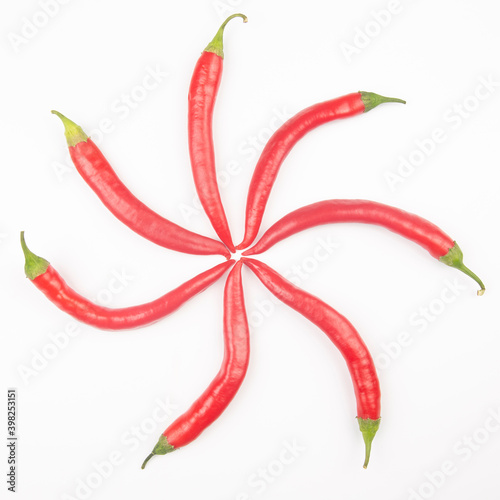 Red hot chili peppers on a white background. food figures. Vitamin vegetable food