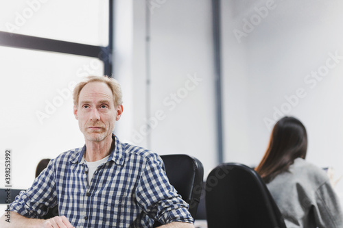 Portrait of man working in office