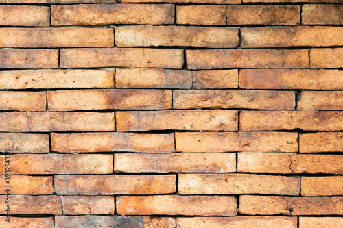 Grunge old red brick pattern wall textured background.