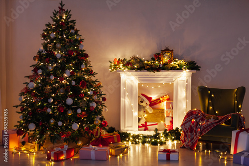 Night lights garland Christmas tree with gifts decor interior new year