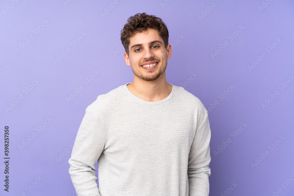 Caucasian man isolated on purple background laughing Caucasian man isolated on purple background laughing