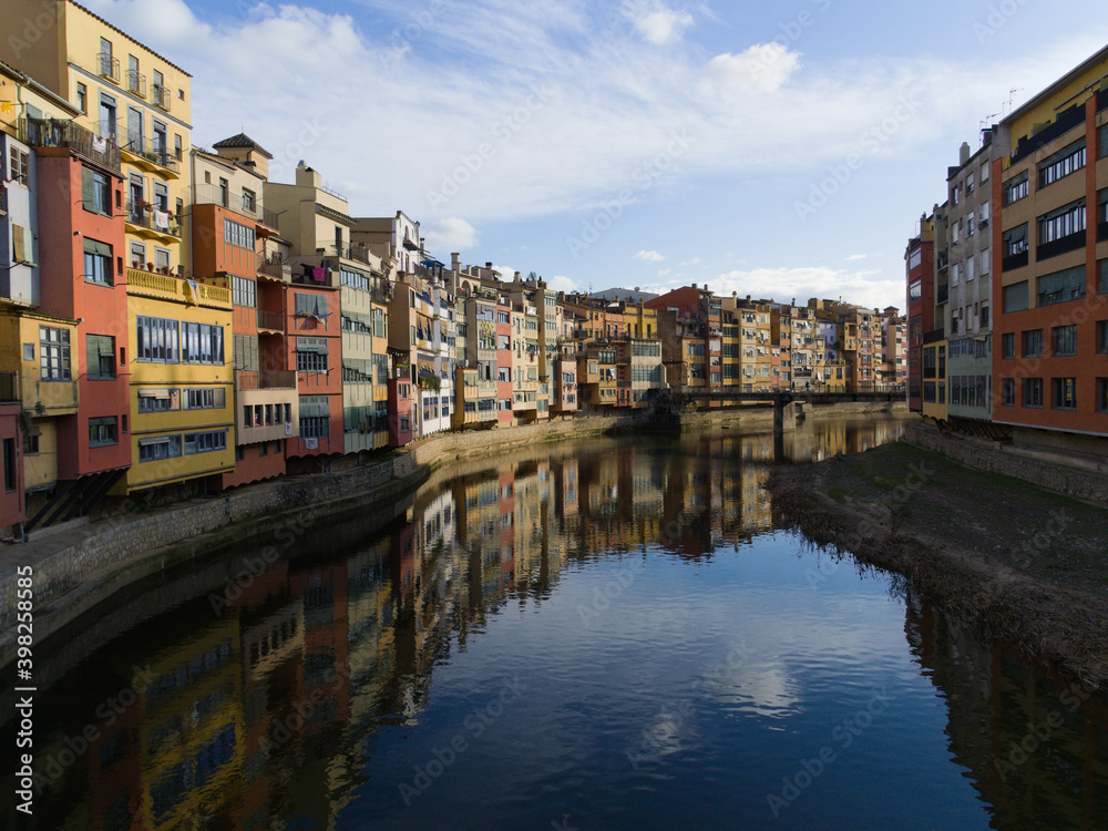 scenic view of the historical part of Girona (onyar river embankment) from one of the bridges