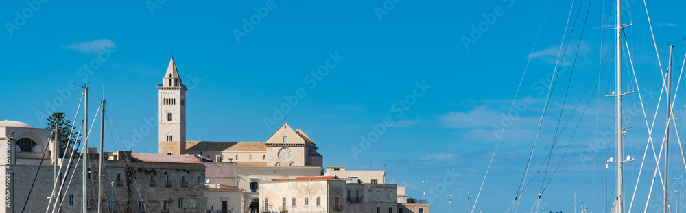 Panorama view Nicola Pellegrino Cathedral and buildings along the boulevard of Trani, Italy