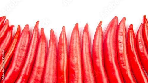 Red hot chili peppers on a white background. food figures. Vitamin vegetable food
