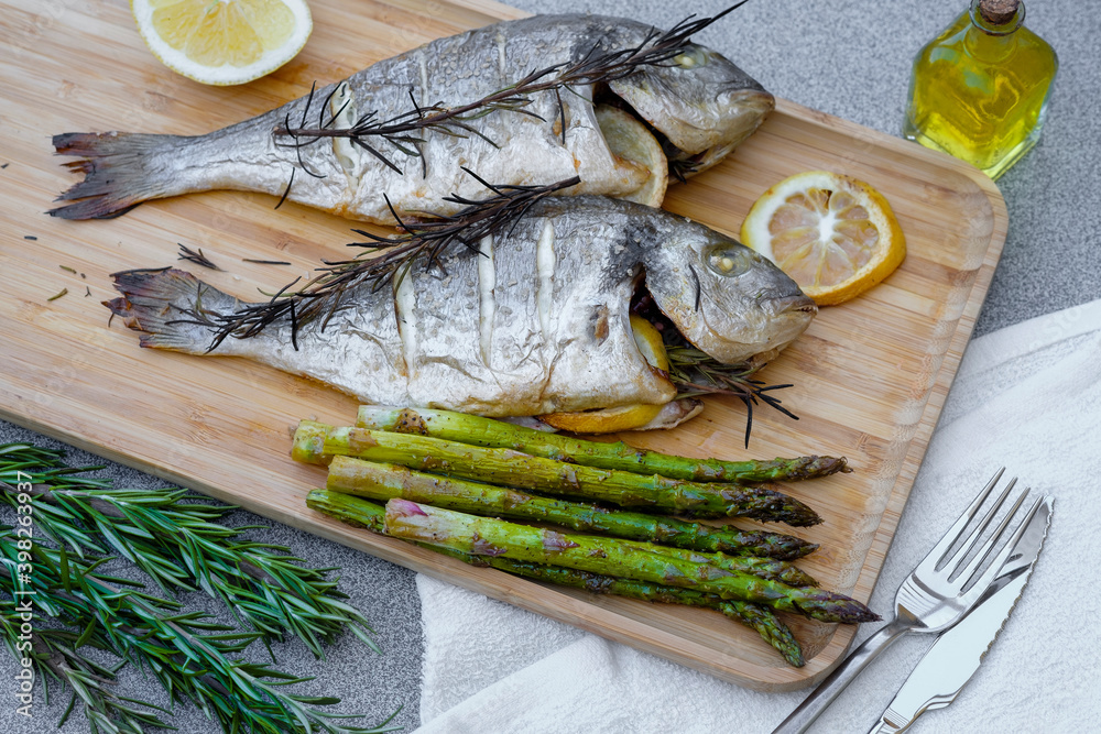 Grilled Dorado with asparagus, lemon and olive oil. Grilled Dorado with asparagus, lemon and olive oil.