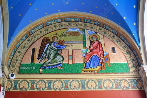 Beautiful mosaic showing the Annunciation to the Virgin Mary outside of Christian orthodox church - Athens, Greece, March 12 2020.