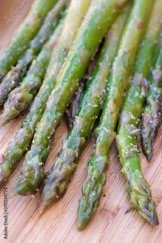Grilled asparagus with spices close-up
