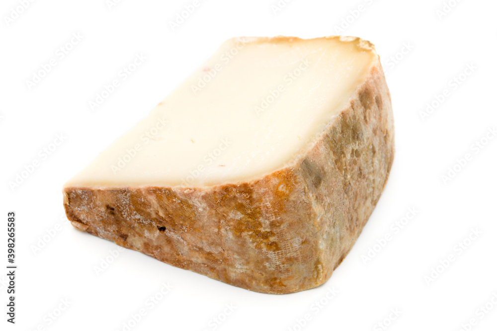 Traditional Basque sheep's milk cheese on white background