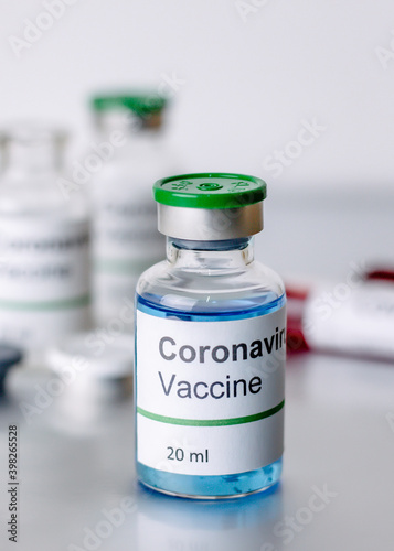  coronavirus covid-19 vaccine in vaccine bottle, doctor in the laboratory with a biological tube for analysis and sampling of Covid-19 infectious ,covid concept