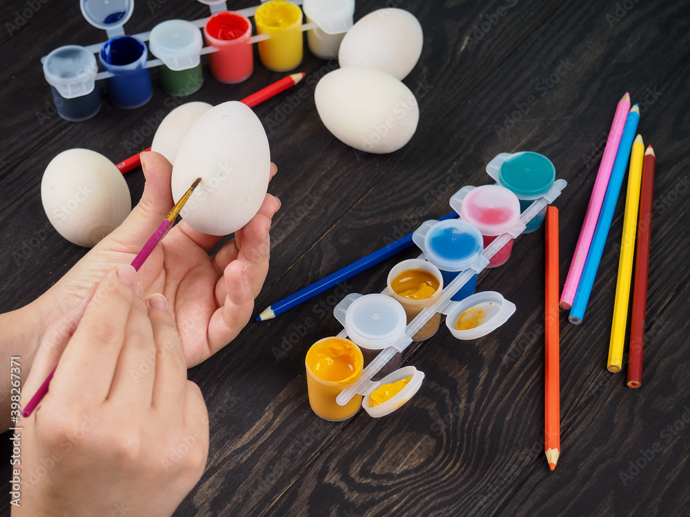 hand painting modern easter egg top view. preparation for holiday, easter celebration. stylish painted egg. hand painting modern easter egg top view. preparation for holiday, easter celebration. stylish painted egg.
