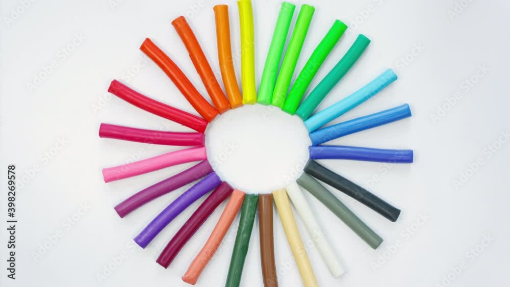 Stop motion of modeling clay pieces. Timelapse plasticine handmade background.  Rainbow set for children play.