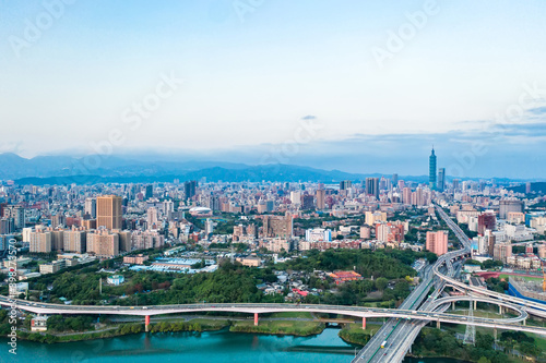 Taipei City Aerial View - Asia business concept image  panoramic modern cityscape building bird   s eye view under sunrise and morning blue bright sky  shot in Taipei  Taiwan