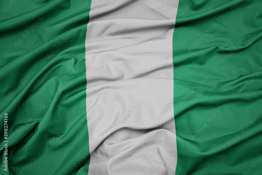 waving colorful national flag of nigeria. waving colorful national flag of nigeria.