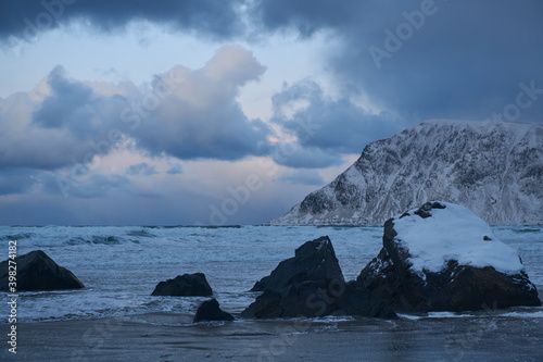 norway coast in winter with snow bad cloudy weather