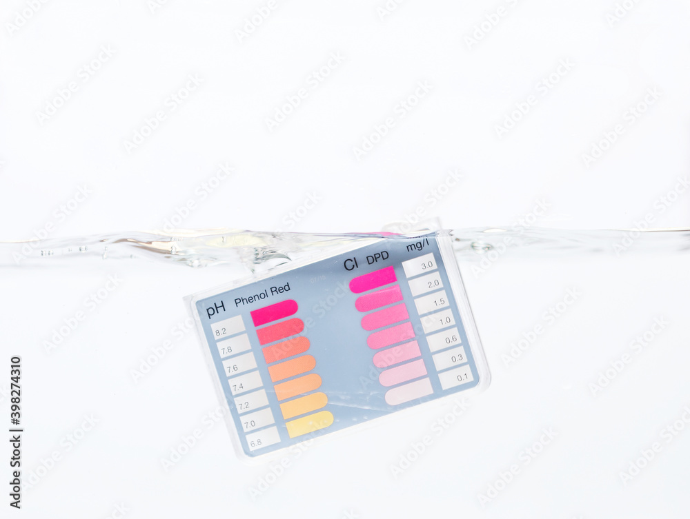 Water testing test kit in water on white background, water quality test tool Water testing test kit in water on white background, water quality test tool