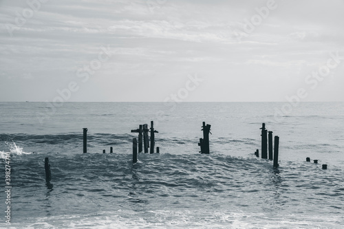 old pier and sea waves © enginakyurt