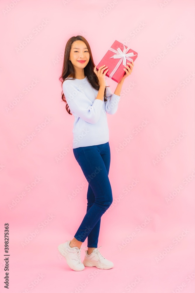 Portrait beautiful young asian woman with red gift box Portrait beautiful young asian woman with red gift box
