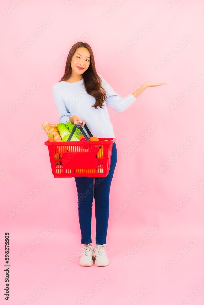 Portrait beautiful young asian woman with fruit vegetable and grocery in basket Portrait beautiful young asian woman with fruit vegetable and grocery in basket