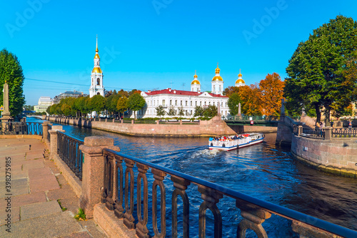 View of the dome of St. Nicholas naval Cathedral from the intersection of the Griboyedov canal and Kryukov canal, Krasnogvardeysky bridge.Saint-Petersburg. photo