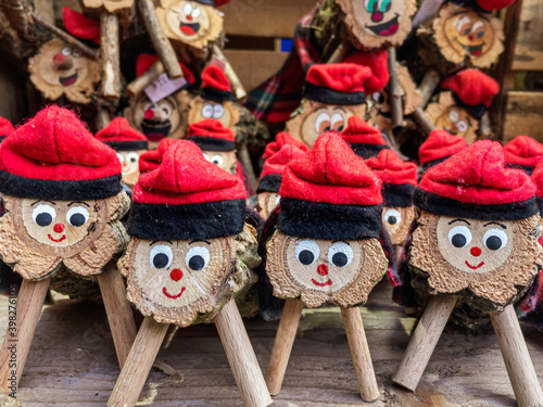 Artisan tio de nadal, a typical christmas character from catalonia, spain, in a christmas market