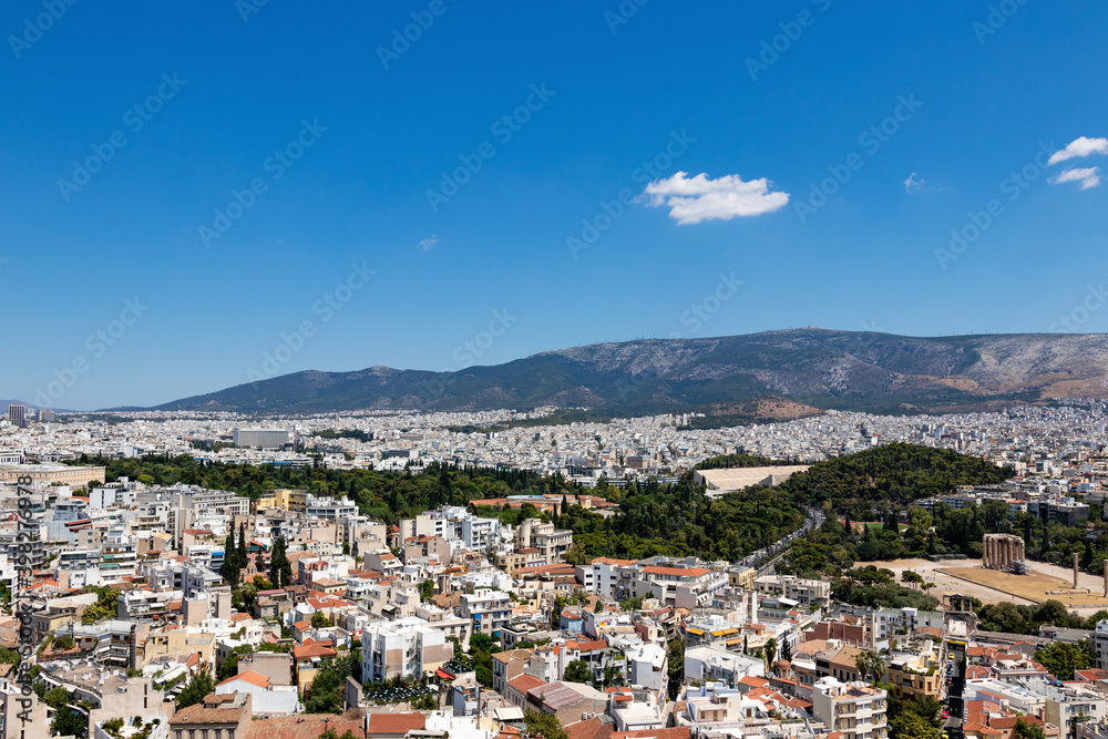 Hills, mountains and dense buildings of the city of Athens