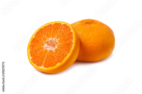 Ripe tangerines and slices isolated on white background