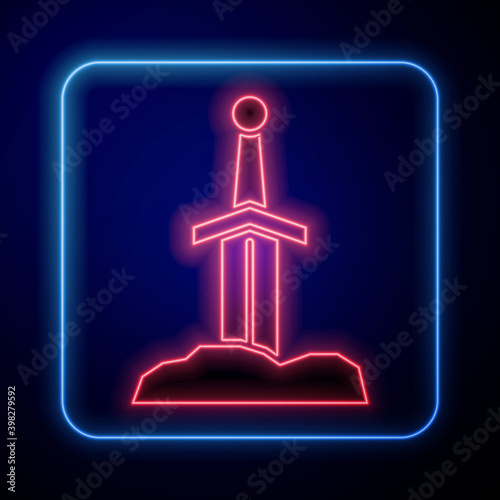 Glowing neon Sword in the stone icon isolated on blue background. Excalibur the sword in the stone from the Arthurian legends. Vector.