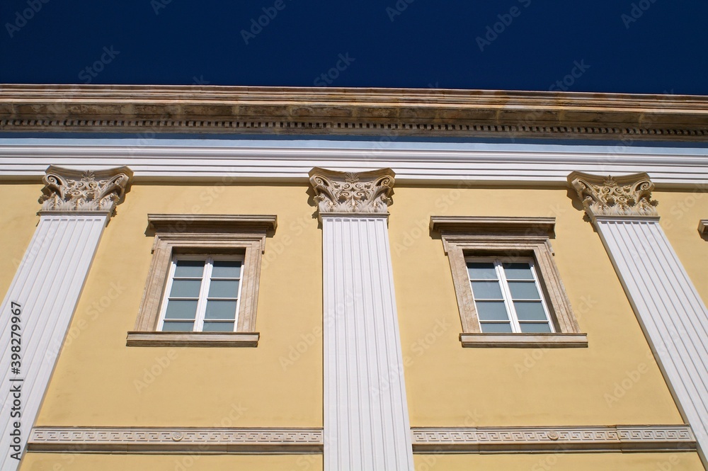 View of the exterior wall of the Christian orthodox church of Agios Nikolaos in Hermoupolis, Syros, Greece. View of the exterior wall of the Christian orthodox church of Agios Nikolaos in Hermoupolis, Syros, Greece.