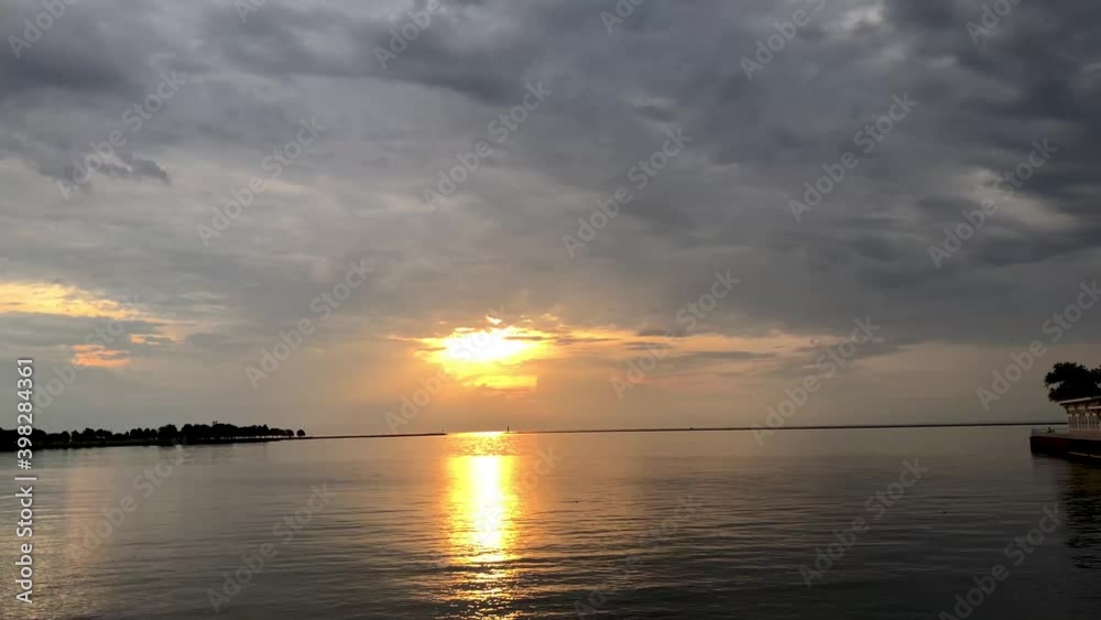 Dramatic sun rays above the ocean in the evening Dramatic sun rays above the ocean in the evening
