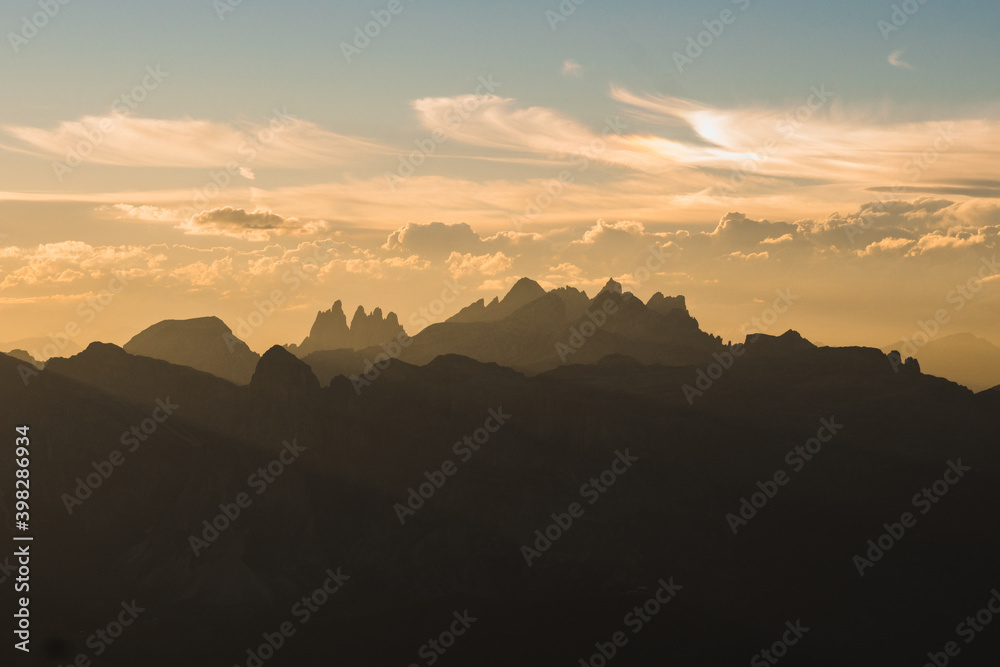 Beautiful scenic views of rocks and shadows at sunset in the Dolomites. Gorgeous stunning mountains in the golden hour. Italy Beautiful scenic views of rocks and shadows at sunset in the Dolomites. Gorgeous stunning mountains in the golden hour. Italy