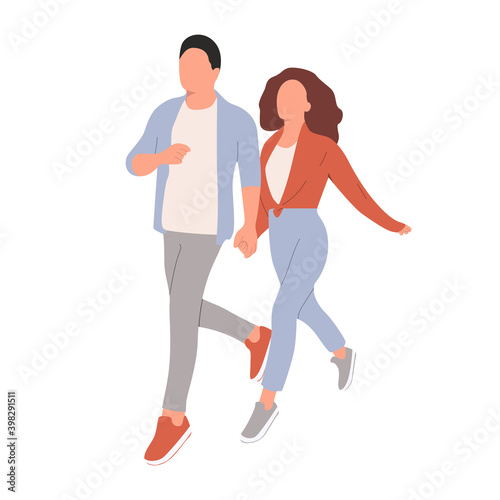 The guy and the girl happily walk holding hands. Happy couple