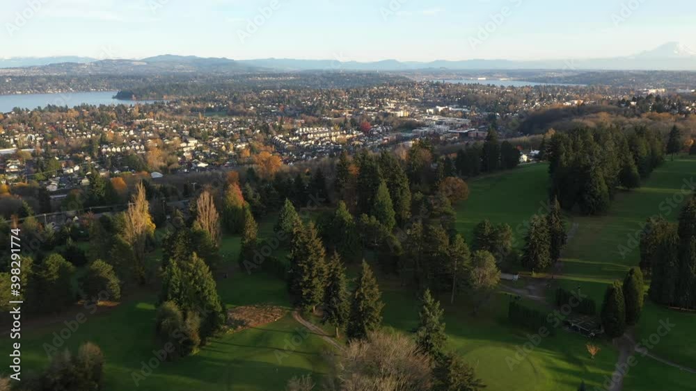 Cinematic sunset tracking clip of South Seattle, Lakewood, Rainier Vista, Mt. Baker, North Beacon Hill, Seward Park, Mercer Island, Lake Washington in King County, Washington Cinematic sunset tracking clip of South Seattle, Lakewood, Rainier Vista, Mt. Baker, North Beacon Hill, Seward Park, Mercer Island, Lake Washington in King County, Washington