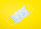 Protection medicine mask on a yellow background