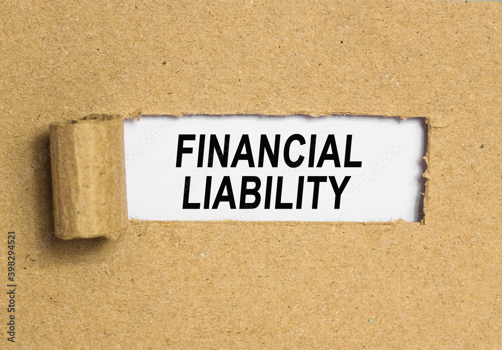 Obraz premium The text save today for tomorrow. behind torn brown paper. Business Concept image. FINANNCIAL LIABILITY