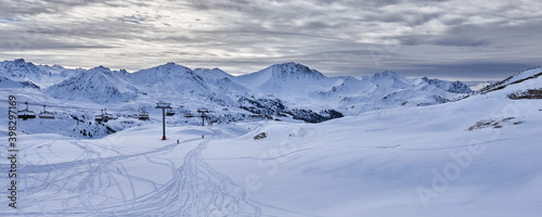 Winter mountain panoramic snowy view from the ski piste in Tignes Ski Resort.