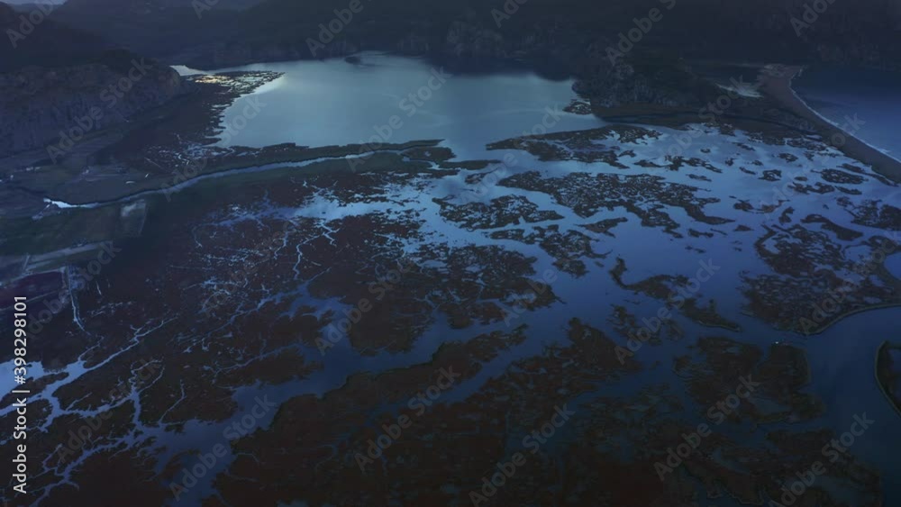 Aerial view of Dalyan delta.iztuzu beach and mountains at sunrise.4K. aerial view of natural beauty. Aerial view of Dalyan delta.iztuzu beach and mountains at sunrise.4K. aerial view of natural beauty.