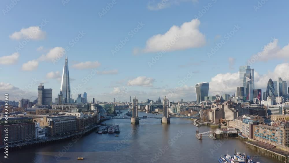 Slow descending drone shot of tower bridge and Central London over river thames Slow descending drone shot of tower bridge and Central London over river thames