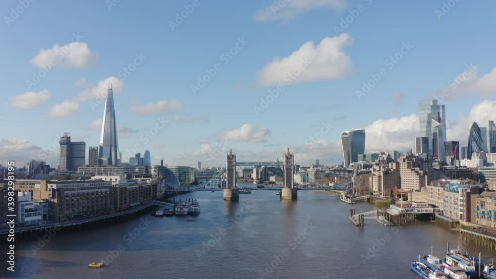 Establishing Aerial dolly forward rising drone shot of central London Tower Bridge shard river thames Establishing Aerial dolly forward rising drone shot of central London Tower Bridge shard river thames