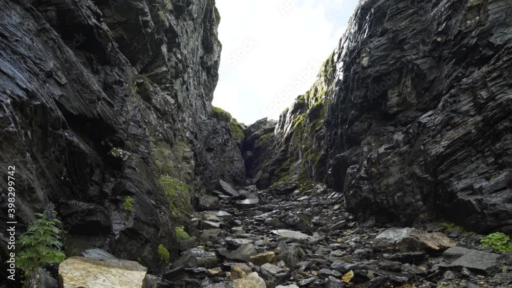 Smooth flowing water over rocks in the Mountains, Romania. Smooth flowing water over rocks in the Mountains, Romania.