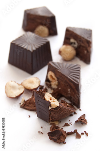Broken chocolate candies with hazelnut inside