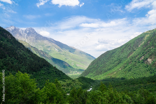 A mountain valley opens up between the Caucasus mountains