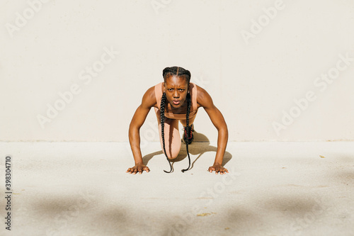 Young woman training.