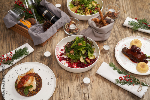 Fototapeta Naklejka Na Ścianę i Meble -  Christmas food table setting, top view