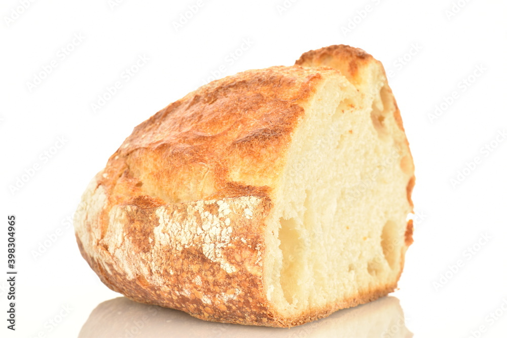 Fragrant French hearth bread, close-up, isolated on white.