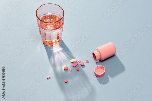 Medicine or Pill in the Pill Box and a Glass of Water photo