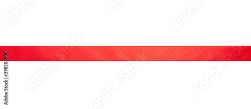 Red satin ribbon isolated cutout on white background