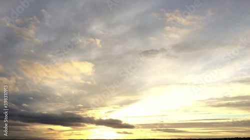 sunset time lapse with sun and clouds