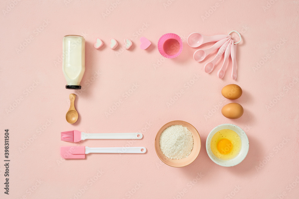 Frame of food ingredients for baking on a gently pink pastel background. Cooking flat lay with copy space. Top view. Baking concept. Mockup. Frame of food ingredients for baking on a gently pink pastel background. Cooking flat lay with copy space. Top view. Baking concept. Mockup.
