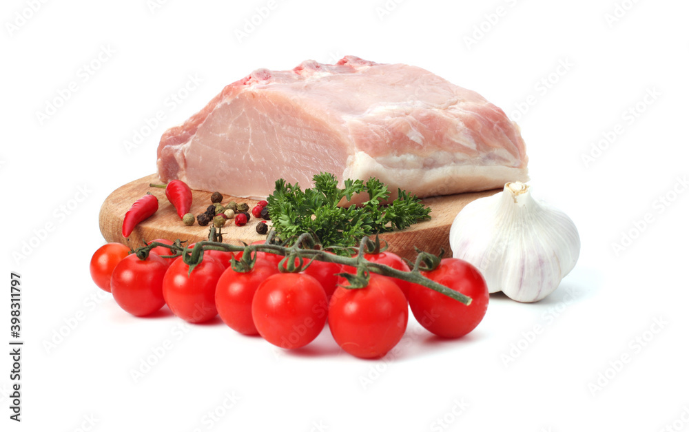Pork meat with vegetables on white background.